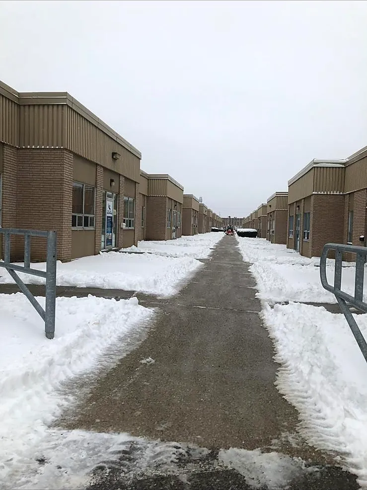 Commercial plaza walkway cleared and salted after a snowfall